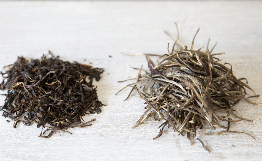 Kenya hand-rolled purple varietal oolong (left) and silver needle purple varietal white tea leaves (right) from the online retailer What-Cha.