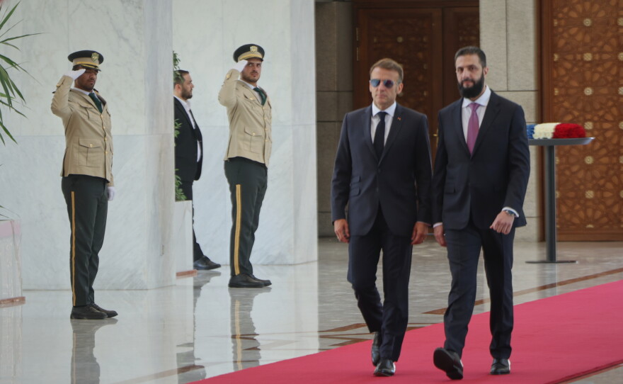 Syrian President Ahmad al-Sharaa, right, meets French President Emmanuel Macron at the presidential palace in Damascus, Syria on Tuesday.