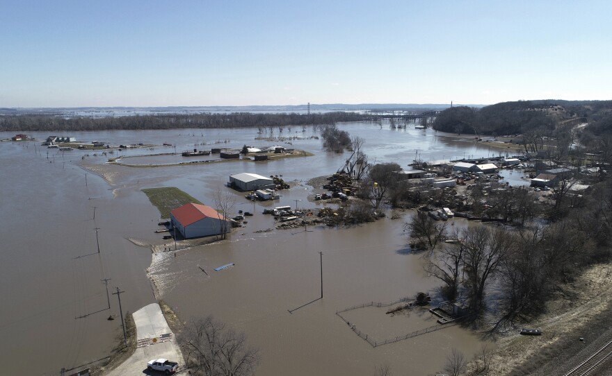 This Wednesday aerial photo shows flooding near the Platte River in in Plattsmouth, Neb., south of Omaha.