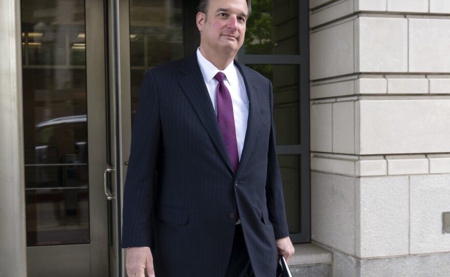 Attorney Michael Sussmann leaves federal court in Washington on April 27.