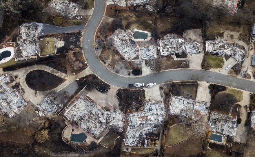 Homes leveled by the Camp Fire line Valley Ridge Drive in Paradise, Calif. Some recovery efforts are stalled by the government shutdown, creating anxiety among survivors and concern for officials.