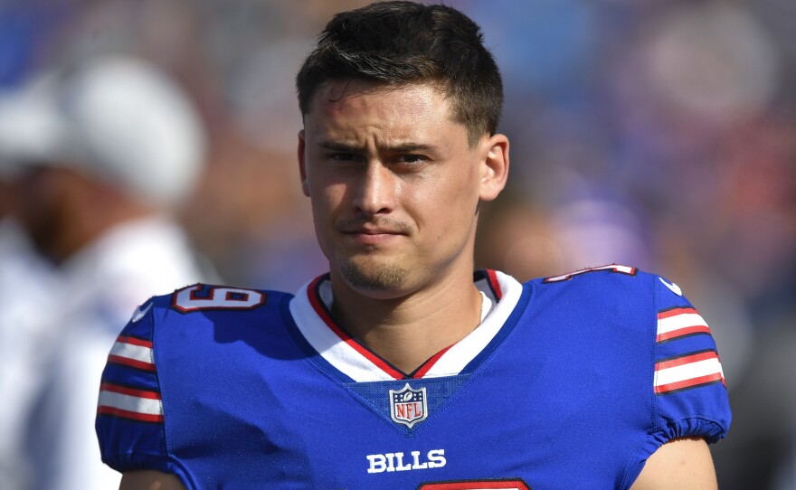 Fill photo of ex-Buffalo Bills punter Matt Araiza walking on the sideline during the first half of a preseason NFL football game against the Indianapolis Colts in Orchard Park, N.Y., on Aug. 13, 2022.