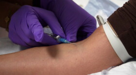 In this image taken from video, an IV infusion is administered at Pure Alchemy Wellness in Chula Vista, Calif., in November 2025.