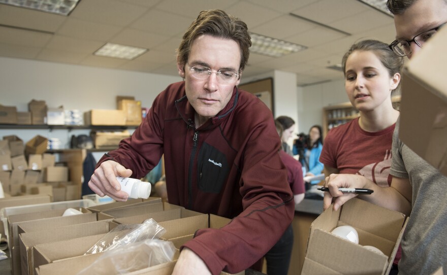 Marc Edwards and his student team assemble water test kits that will be sent to Flint, Mich., for residents to test their water for lead.