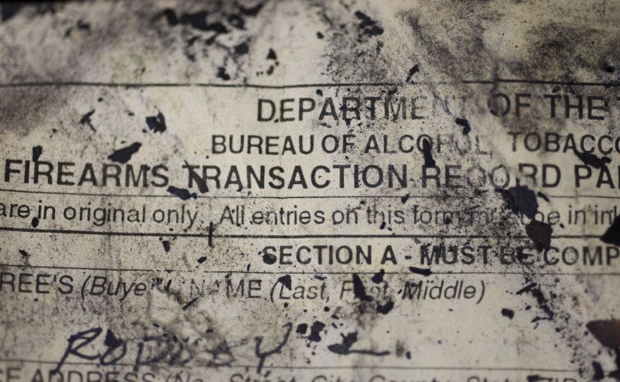 The Bureau of Alcohol, Tobacco, Firearms and Explosives (ATF) processes firearm transaction documents from firearms dealers no longer in business, no matter the condition of the documents, such as this fire and water damaged ledger at their National Trace Center in Martinsburg, W.Va.