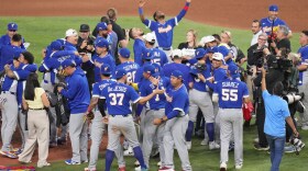 The Venezuela team celebrates after defeating the United States in the championship game of the World Baseball Classic, Tuesday, March 17, 2026, in Miami.