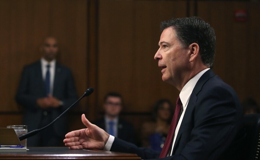 Former FBI Director James Comey testifies during a Senate intelligence committee hearing on Capitol Hill last June.