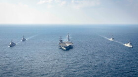 FILE - In this photo provided by South Korea Defense Ministry, warships of South Korea, the United States and Japan including the USS George Washington aircraft carrier, bottom center, take part in the trilateral Freedom Edge exercise in international waters off South Korea's southern island of Jeju, on Nov. 13, 2024.