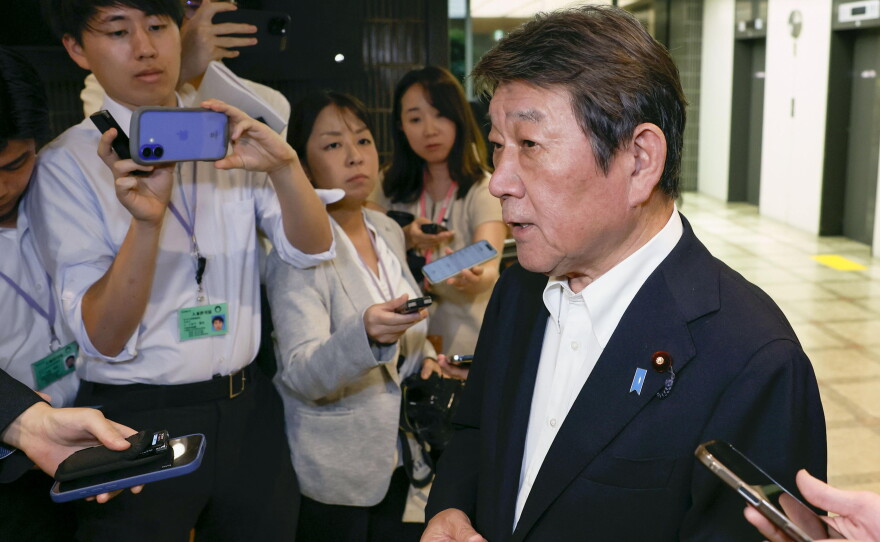 Japanese Foreign Minister Toshimitsu Motegi, right, speaks to reporters after he summoned Russian Ambassador to Japan Nikolay Nozdev, not pictured, in Tokyo Thursday, Aug. 13, 2026.