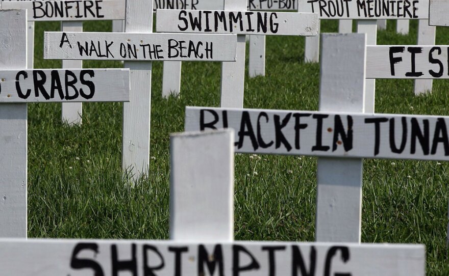 A memorial of crosses built by Patrick Shay and his neighbors in Grand Isle, La., reflects the many things they feel they've lost because of the Gulf of Mexico oil spill.