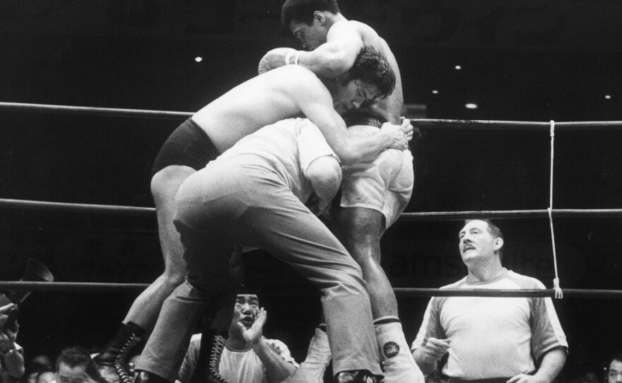 Heavyweight boxer Muhammad Ali fighting the champion Japanese wrestler Antonio Inoki at Budokan Hall in Tokyo in 1976.