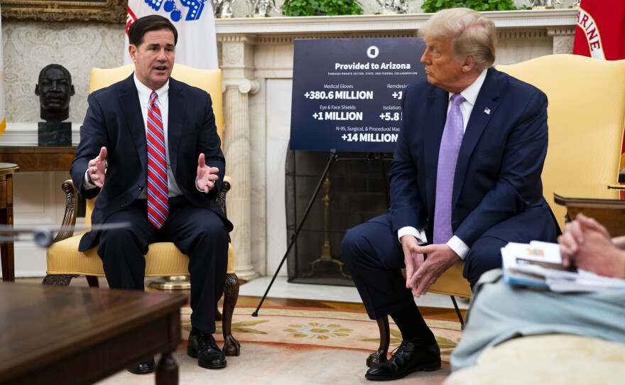 Trump meets with Arizona Gov. Doug Ducey in the White House on Aug. 5. Geovanny is angry about how the state has handled the pandemic. That may be a motivating factor for him this fall, he said.