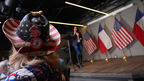 The hat of Diane Benjamin, Dallas #2021 precinct chair, is visible at a campaign event for Texas Attorney General Ken Paxton on May 18, 2026, in Dallas.