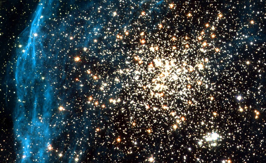 This image recorded by the Hubble telescope on July 10, 2001 shows two clusters of stars in a neighboring galaxy.