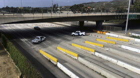 United States Customs and Border Protection officials block access to Tijuana, Mexico, at the San Ysidro Port of Entry with San Diego, Calif., Sunday, Jan. 22, 2017.