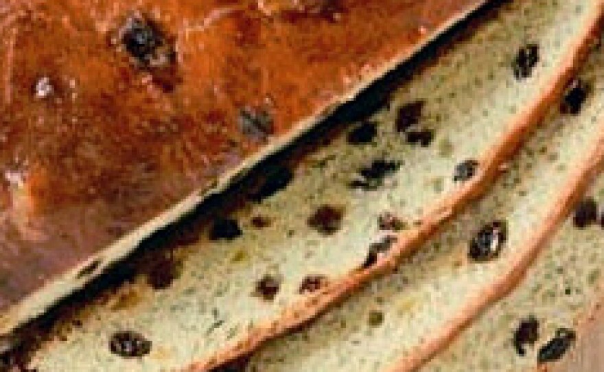 Norwegian julekake is made with a sweet dough, rich in eggs and sugar, and filled with candied fruit.