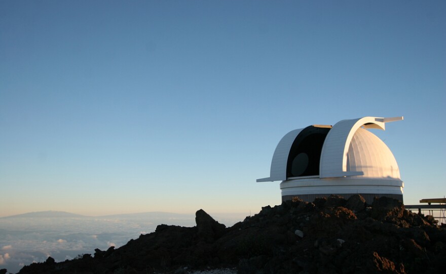 Observatories prepare for a night of research on Haleakala, Hawaii.