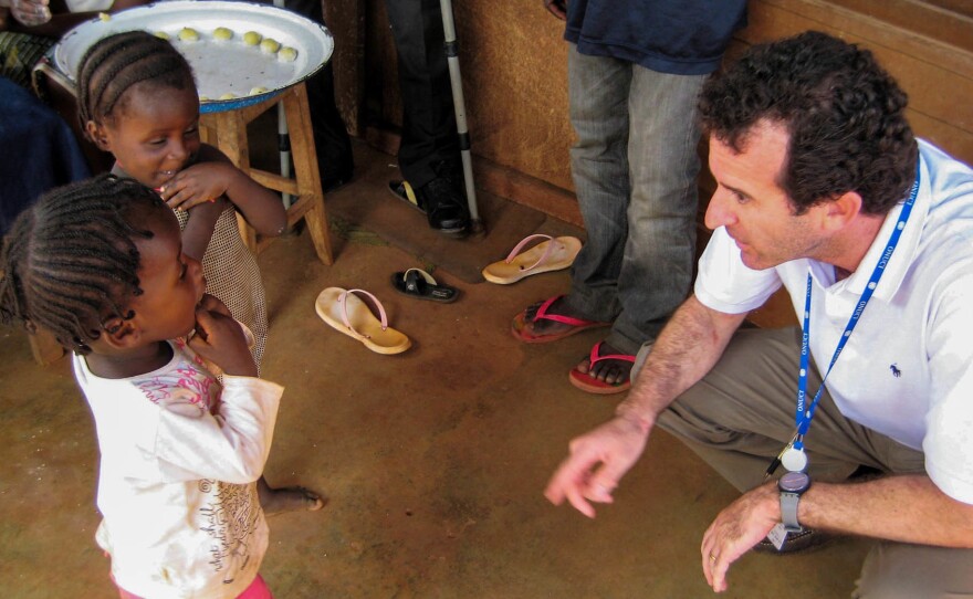 Paul Spiegel meets children displaced by conflict in Ivory Coast in 2011.