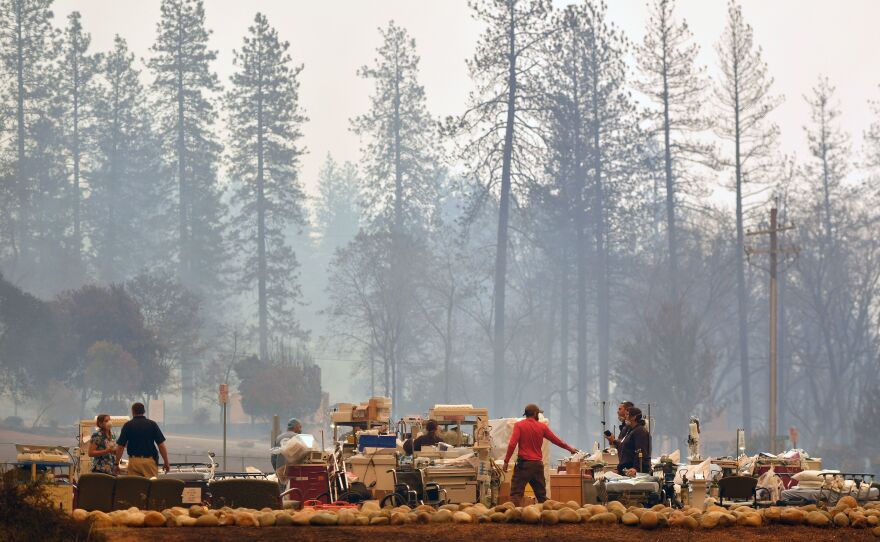 Search and rescue teams scramble to get patients and medical devices to safety as the Camp Fire cuts a fiery path through Paradise.