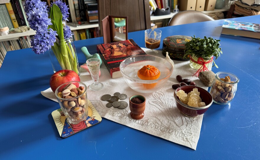 Nozlee Samadzadeh's haft sin — a traditional table set for Nowruz featuring symbolic objects.