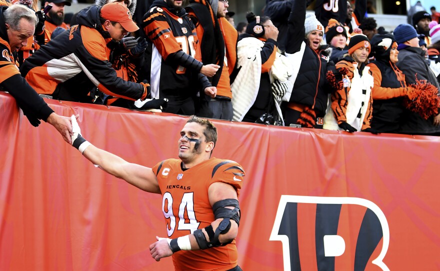 Cincinnati Bengals defensive end Sam Hubbard celebrates with fans after the team's win over the Pittsburgh Steelers in November. Hubbard, who grew up in Cincinnati, uses his social media platforms to promote local causes.
