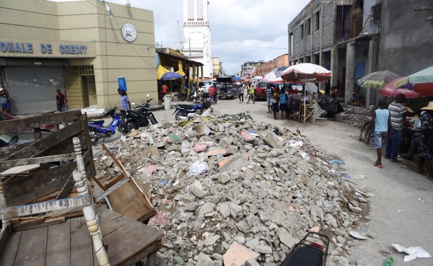 People in Les Cayes continue with daily life following the devastating Aug. 14. quake.