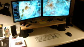 Computer monitors are pictured on a stand, July 18, 2009.