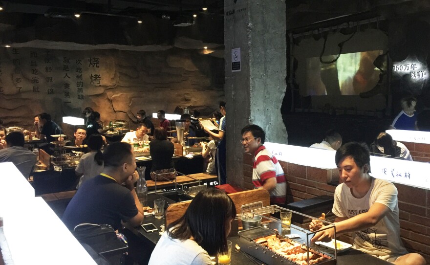 The Beijing restaurant named A Very Long Time Ago caters to relatively wealthy, young customers who are willing to pay for better service. They are leading a small-scale revival of tipping not seen in Chinese restaurants for decades.