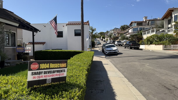 A sign in the front yard of a home in Point Loma reads "Stop 1004 Rosecrans — shady developments in our neighborhood," Oct. 16, 2026.