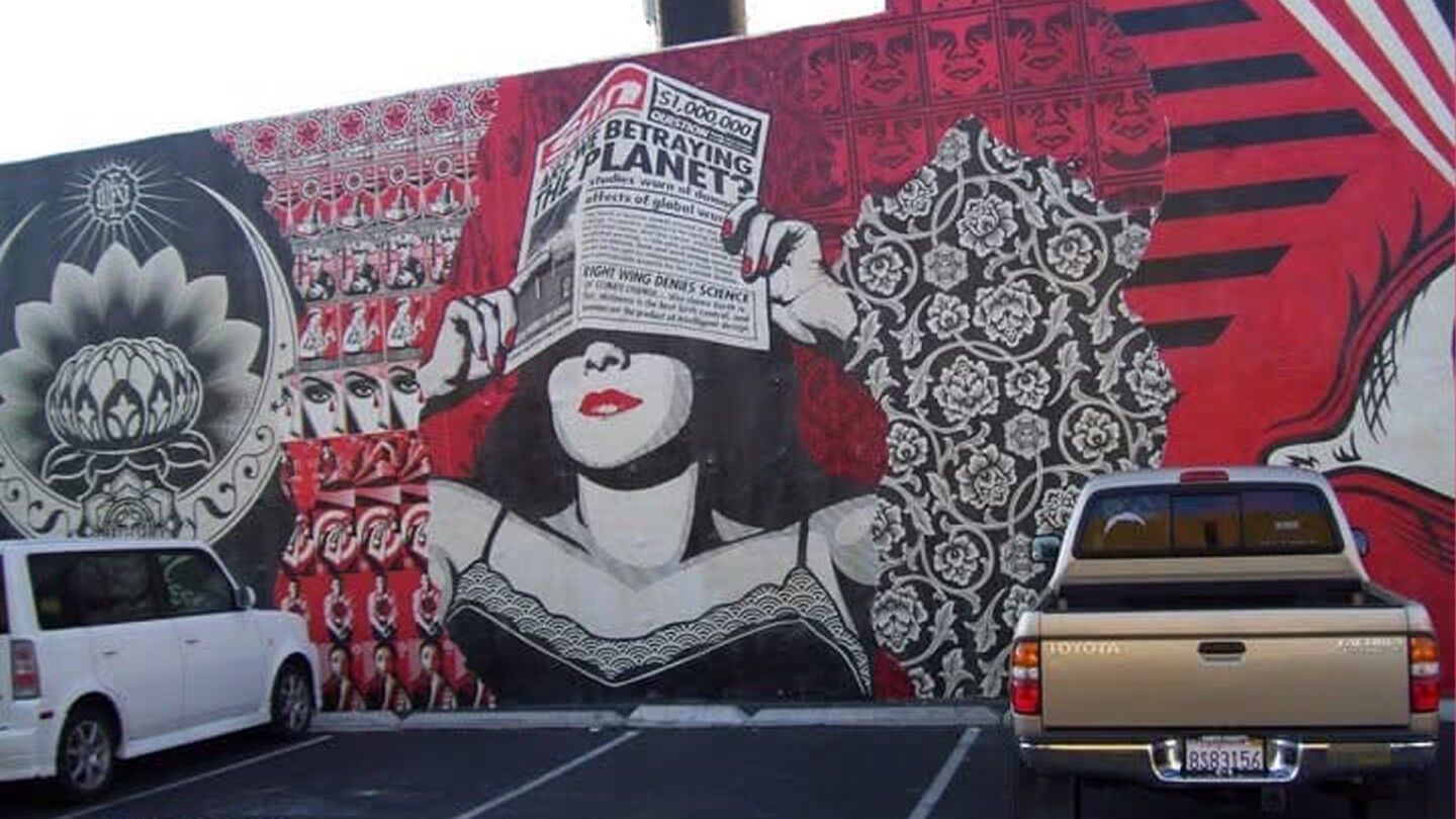 A love story at Bar Dynamite<br/>by Adrienne Hotaling<br/><br/>My husband and I met the old-fashioned way — at a bar through mutual friends who were dating.<br/><br/>It was midsummer in 2010. I was hanging out with my friend, and he was hanging out with his. These two friends were dating and wanted to meet up, so I reluctantly agreed to go to Bar Dynamite so she could see him. I had previously sworn off men and wasn't about to get all dolled up for the bar. But I could at least look cute, so I wore shorts and a tank toop. My hair would have to do.<br/><br/>When we met up, I immediately thought he was cute. We danced the night away, and he ordered the same cocktails I did to make it easier for the bartender.<br/><br/>After last call, we drove up the hill to see the Shepard Fairey Obey mural in Hillcrest. He's a huge fan but hadn't had a chance to see it yet. Standing in front of the mural, we kissed, and it was like the night stood still.<br/><br/>We've been together ever since — married with two kids.<br/><br/>We had many more fun nights at Bar D, dancing to the DJ. My husband'ss friend eventually became a DJ there, and my husband even took part in DJ battles.<br/><br/>Every time we drive down Washington Street and pass Bar D, I instantly remember that night.