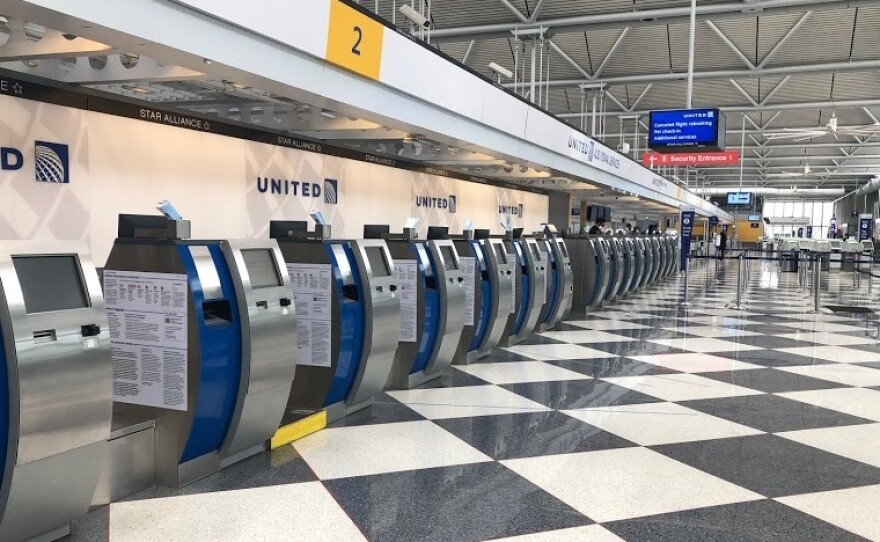 An empty terminal at Chicago's O'Hare International Airport. The normally bustling check-in at the United Airlines terminal was eerily quiet on April 24.