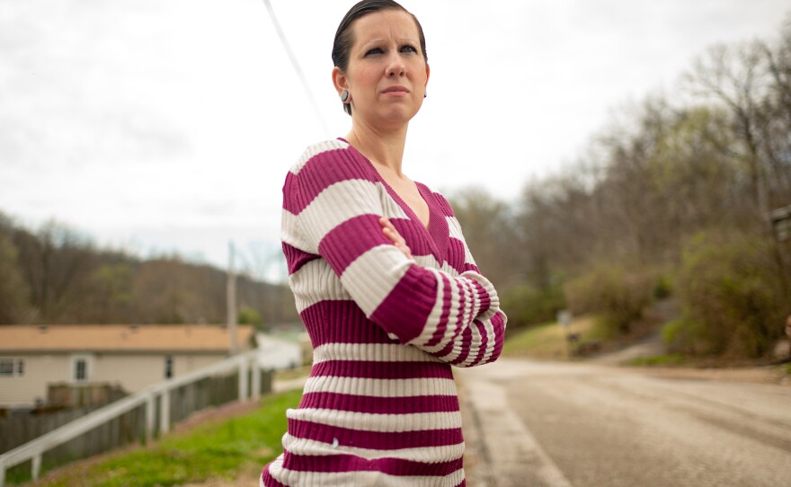 Brittany Bonds poses for a portrait outside her home in Imperial, Missouri in April.