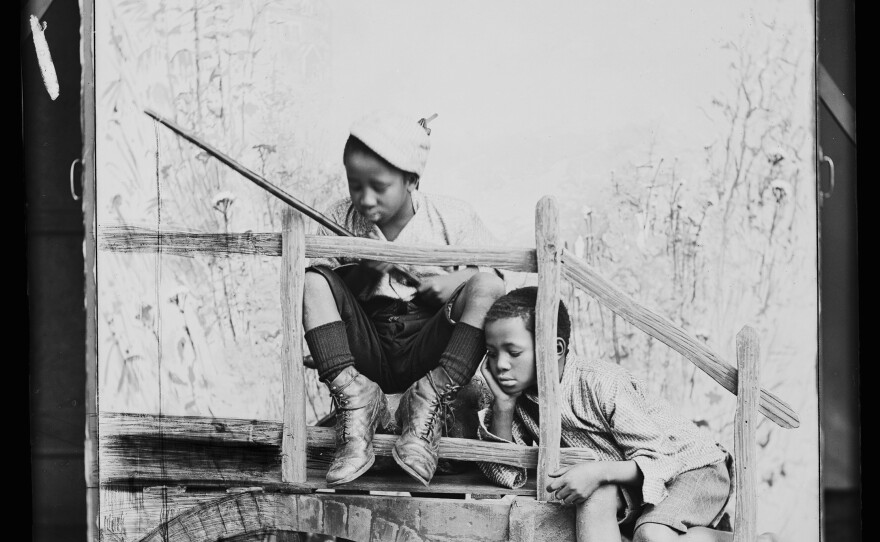 South African singers Albert Jonas and John Xiniwe, of The African Choir, in a staged fishing scene, 1891. The choir, drawn from seven different South African tribes, toured Britain from 1891 to 1893 to raise funds for a technical college in their home country.