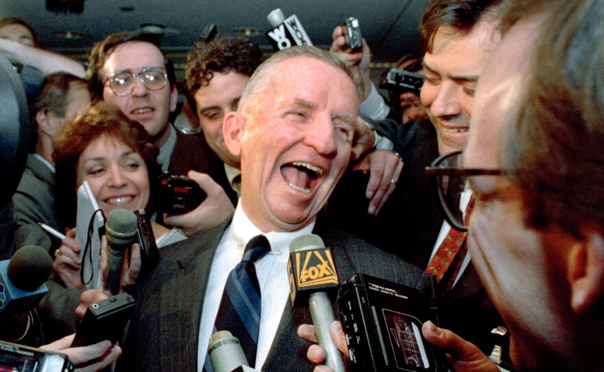 Texas billionaire H. Ross Perot laughs after saying, "Watch my lips," in response to reporters asking when he plans to formally enter the presidential race. Questions came May 5, 1992 in New York City where Perot was speaking before the American Newspapers Publishers Association.