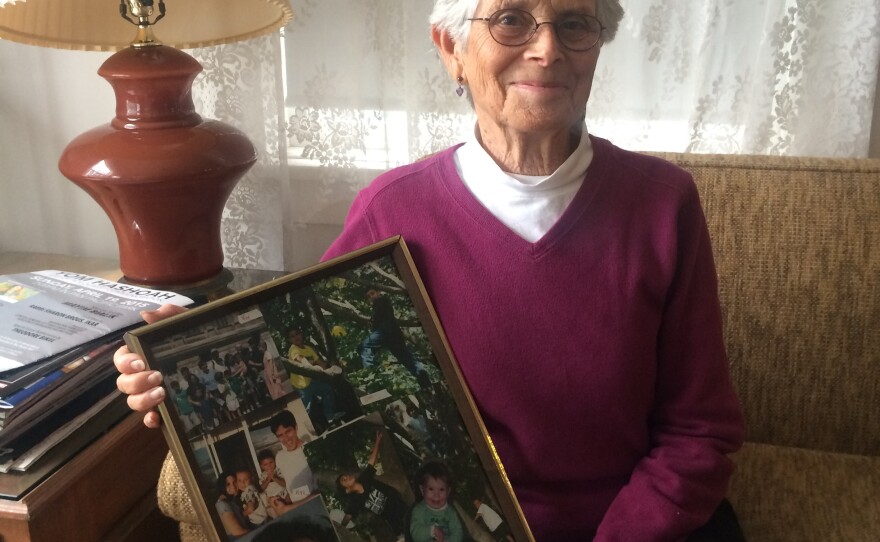 Santa Monica homeowner shows off a photo of her grandchildren. When she goes to visit them, she rents out her home through websites like Airbnb. New rules in Santa Monica make Rosenblatt's rentals illegal.