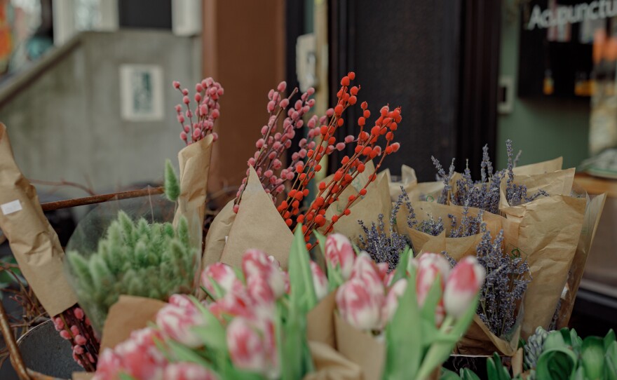 Bouquets for sale outside Life Wellness Center.