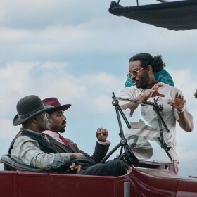 Ryan Coogler directing Michael B. Jordan and Delroy Lindo on the set of "Sinners." Undated photo.
