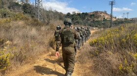 Israeli security forces, including military and police, declared a closed military zone around a olive grove and escorted activists and rabbis away from the area before detaining them near the Israeli settlement of Beitar Illit in the occupied West Bank.