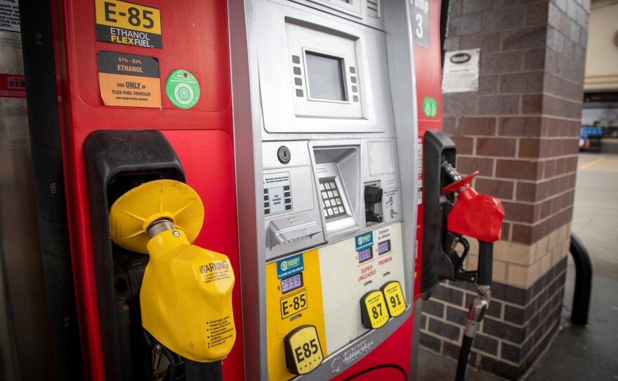 A gas pump at a Kum and Go Convenience Store in Windsor Heights, Iowa shows cheaper prices for ethanol gasoline than standard gasoline.
