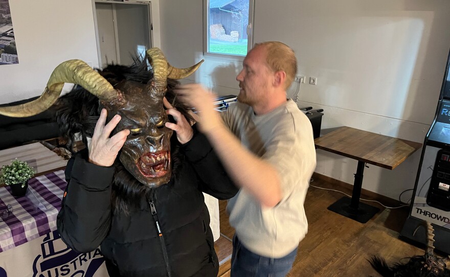 Members of Krampus clubs throughout Austria and the German state of Bavaria gather at a local soccer stadium to change into their Krampus costumes.