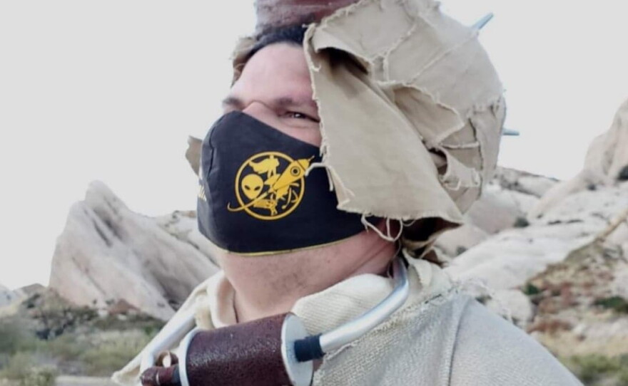 Shawn Mullen relaxing in his Tusken Raider cosplay.