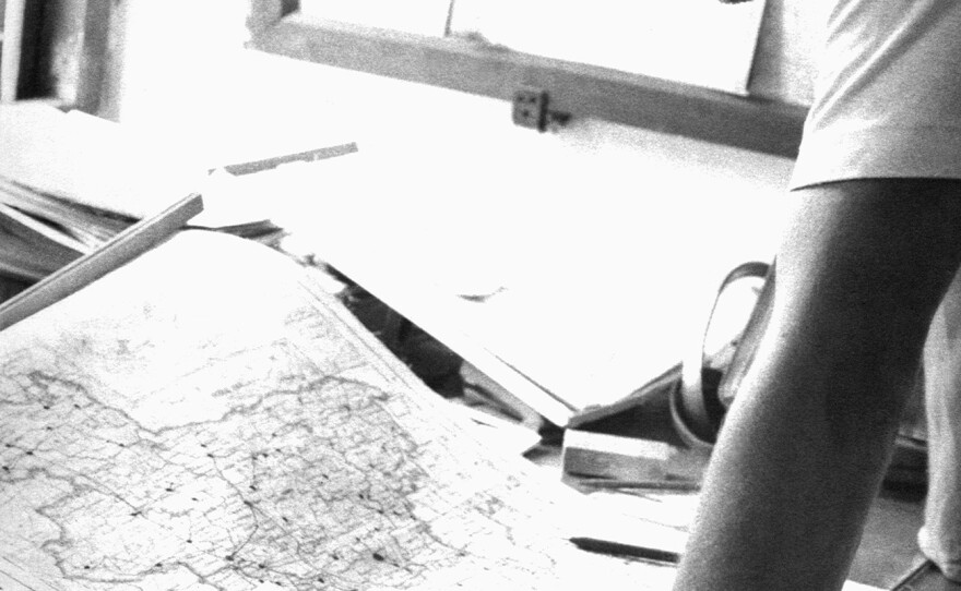 Daniel Tarantola analyzes a Bangladesh district map in 1975 that shows the locations of smallpox cases detected in the region.