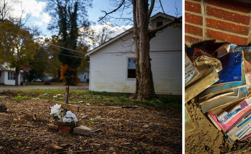 Makeshift memorials as well as destroyed school supplies serve as a reminder of the floods that ripped through the town.