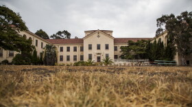 The 388-acre campus of the Veterans Affairs Medical Center in West Los Angeles was donated to the federal government more than 100 years ago for use as a home for disabled veterans, but is no longer used for that purpose. In 2007, Building 209, pictured here, was designated as a place to house disabled homeless vets. It is currently abandoned.