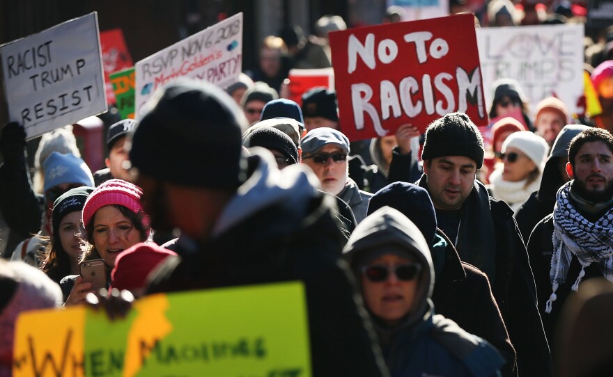 Hundreds of people demonstrate against racism in the Brooklyn neighborhood of Bay Ridge on Martin Luther King Jr. Day on Jan. 15, 2018 in New York City.