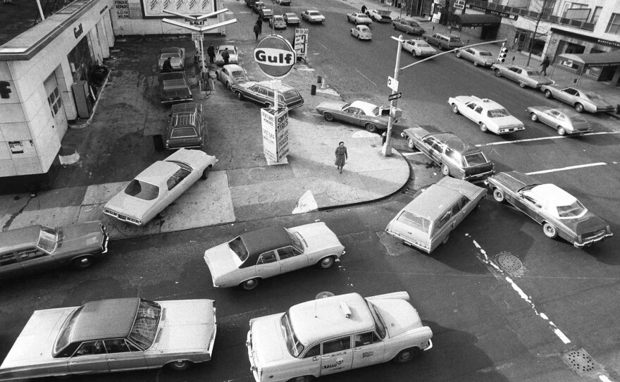 On Dec. 23, 1973, cars line up at a gas station in New York City.