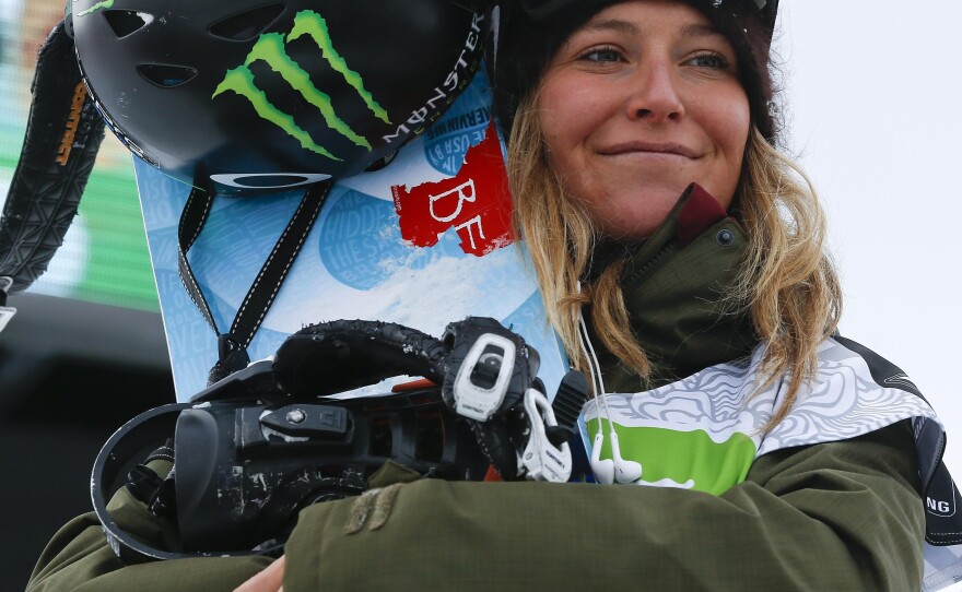 Anderson stands on the podium after winning the women's slopestyle snowboarding final at the Dew Tour iON Mountain Championships last month.