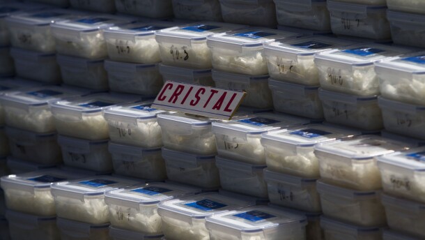 Plastic containers of crystal meth sit on display for the media in Tijuana, Mexico, Tuesday March 15, 2011.