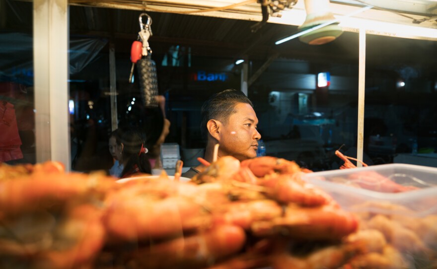 Engkas Kosasih prepares popiah, a spring-roll like dish from from Medan. They come either deep-fried or steamed.
