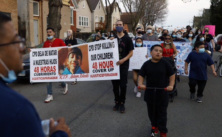 In this April 6, 2021, file photo, members of Chicago's Little Village Community Council protest the death of 13-year-old Adam Toledo.